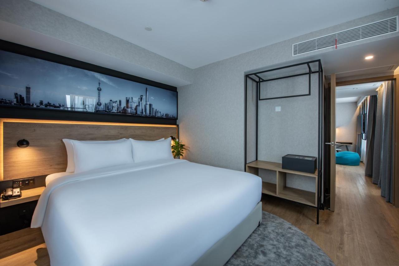 Park Inn By Radisson Shanghai Huanqiugang Exterior foto